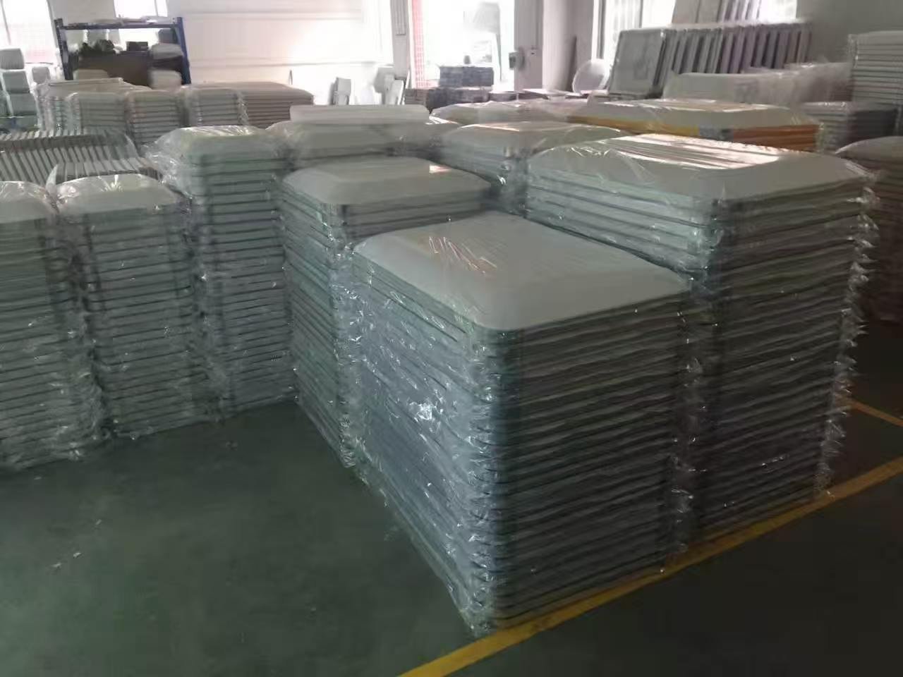 Aluminium lamp panels wrapped and ready for packing